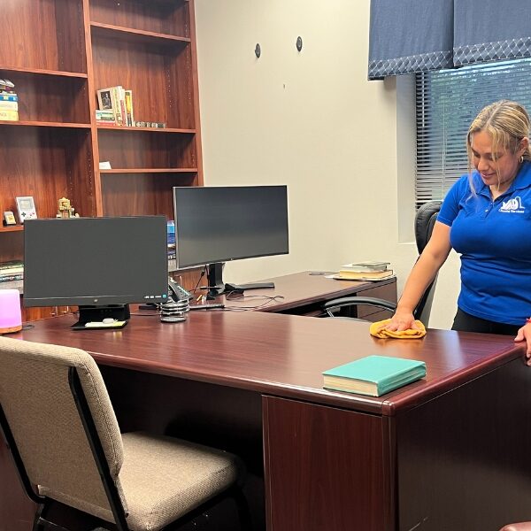 cleaner cleaning an office
